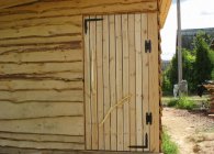 Как сделать деревянную дверь из массива или досок своими руками